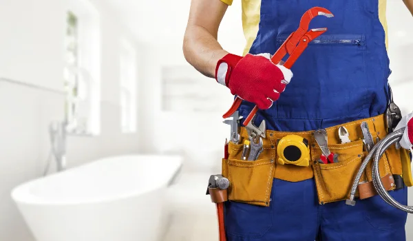 the torso of a plumbing technician showing a tool belt in Cedar Park, TX - Residential Plumbing Services